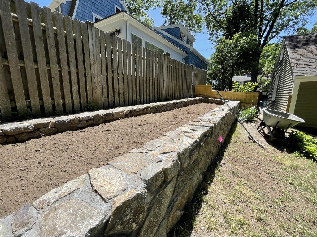 stone wall raised garden bed