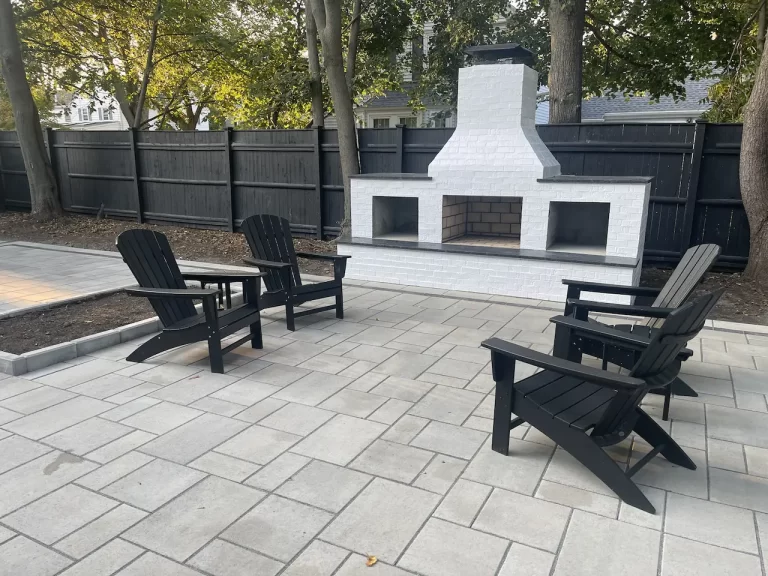 Outdoor Fireplace Patio Seating by Lasana's Landscaping